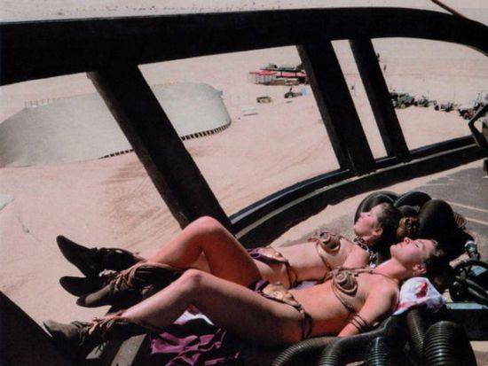 Carrie Fisher and her Princess Leia Body Double sun-bathing on the set of Return of the Jedi
